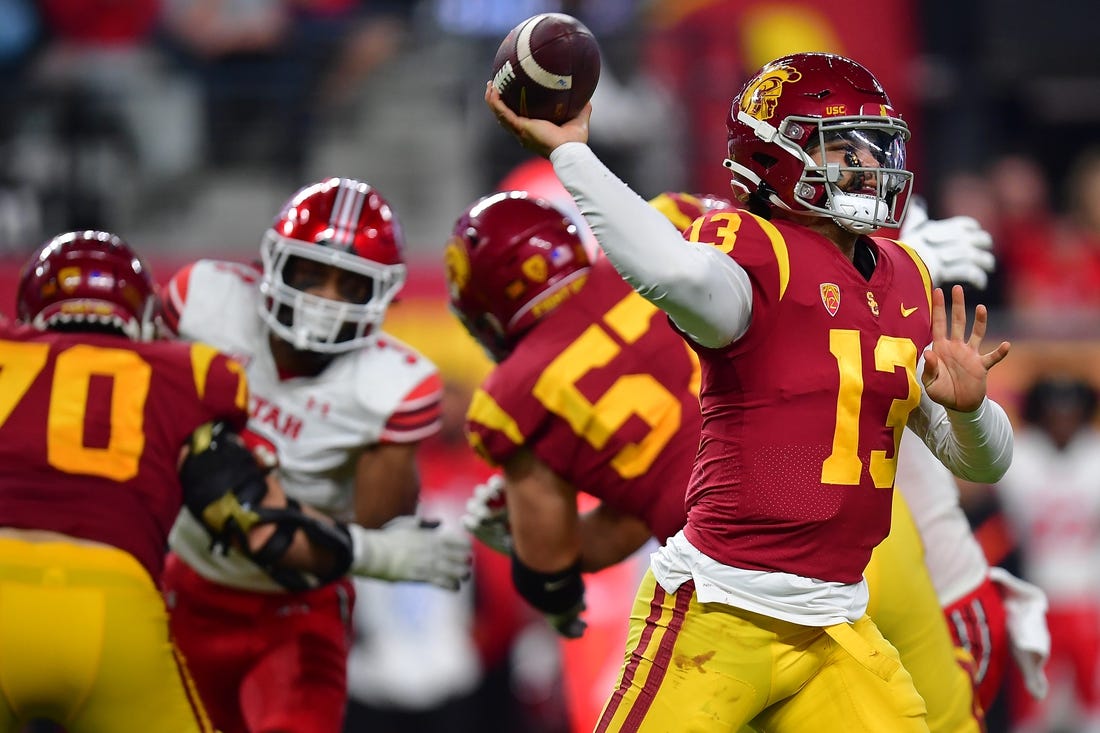 Dec 2, 2022; Las Vegas, NV, USA; Southern California Trojans quarterback Caleb Williams (13) throws against the Utah Utes during the second half in the PAC-12 Football Championship at Allegiant Stadium. Mandatory Credit: Gary A. Vasquez-USA TODAY Sports