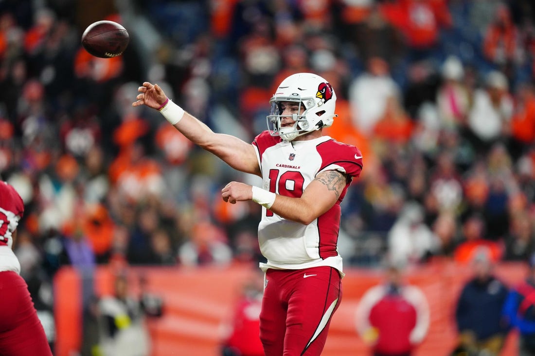 Dec 18, 2022; Denver, Colorado, USA; Arizona Cardinals quarterback Trace McSorley (19) passes the ball in the second half against the Denver Broncos at Empower Field at Mile High. Mandatory Credit: Ron Chenoy-USA TODAY Sports
