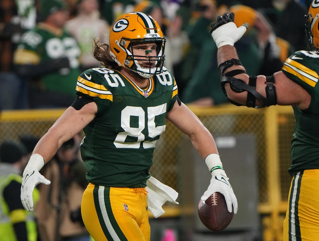Jan 1, 2023; Green Bay, Wisconsin, USA; Green Bay Packers tight end Robert Tonyan (85) celebrates a touchdown reception during the third quarter of their game against the Minnesota Vikings at Lambeau Field. Mandatory Credit: Mark Hoffman-USA TODAY Sports