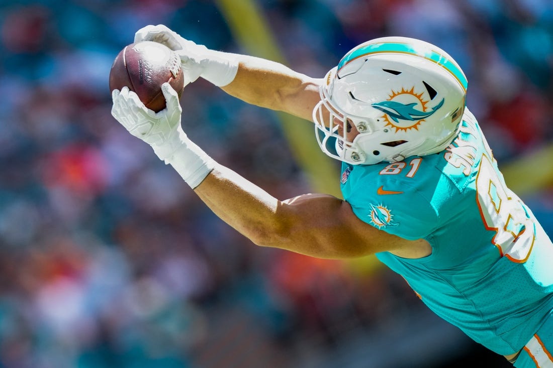 Jan 8, 2023; Miami Gardens, Florida, USA; Miami Dolphins tight end Durham Smythe (81) catches a pass against the New York Jets during the first half at Hard Rock Stadium. Mandatory Credit: Rich Storry-USA TODAY Sports
