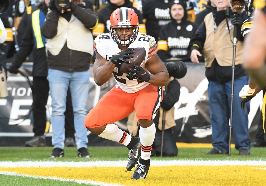 Jan 8, 2023; Pittsburgh, Pennsylvania, USA;  Cleveland Browns running back Nick Chubb (24) scores a touchdown against the Pittsburgh Steelers during the fourth quarter at Acrisure Stadium. Mandatory Credit: Philip G. Pavely-USA TODAY Sports