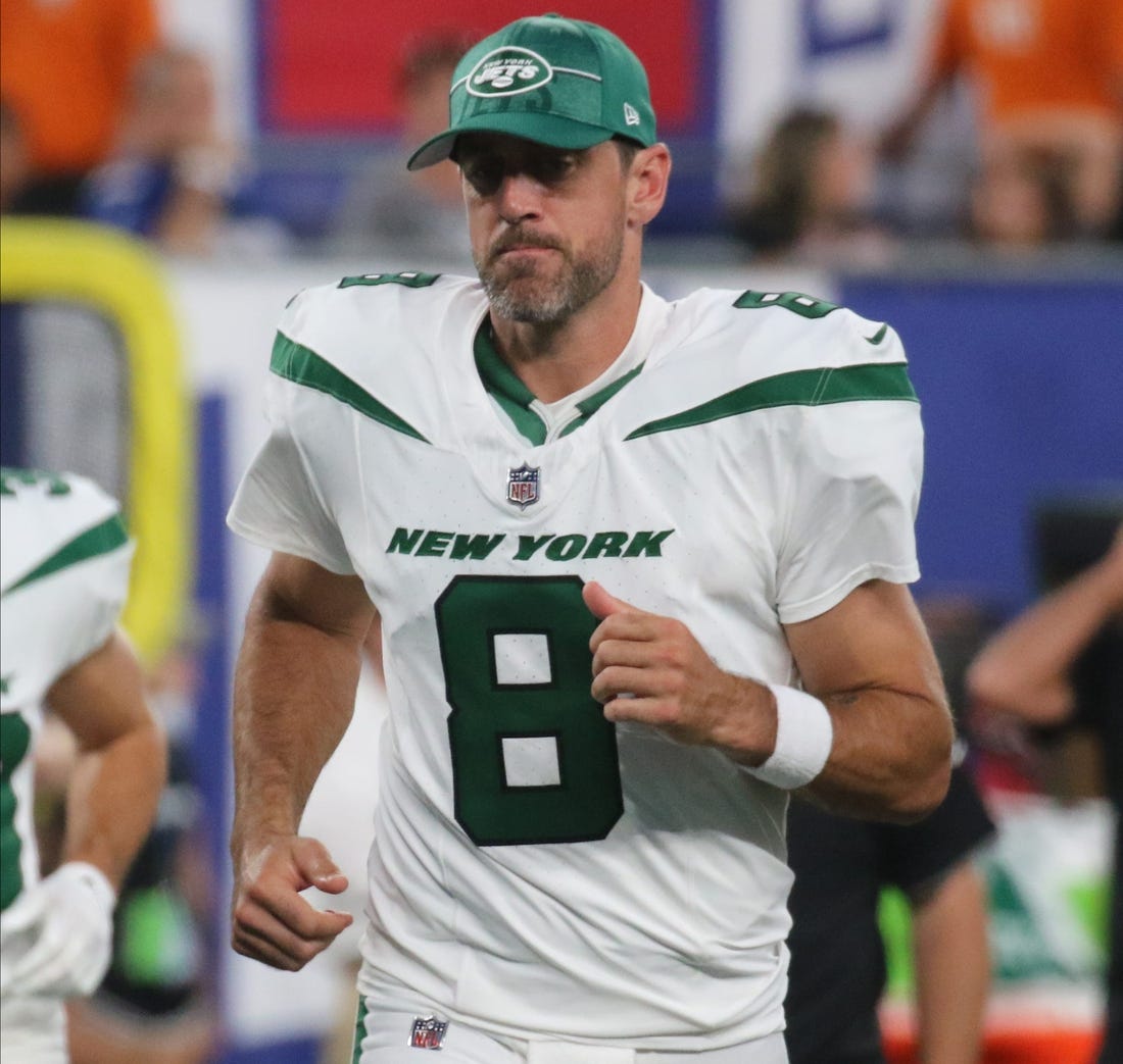 East Rutherford, NJ August 26, 2023 -- Jets quarterback Aaron Rodgers at the end of the first half. The NY Jets against the NY Giants on August 26, 2023 at MetLife Stadium in East Rutherford, NJ, as the rivals play their final preseason game before the start of the NFL season.