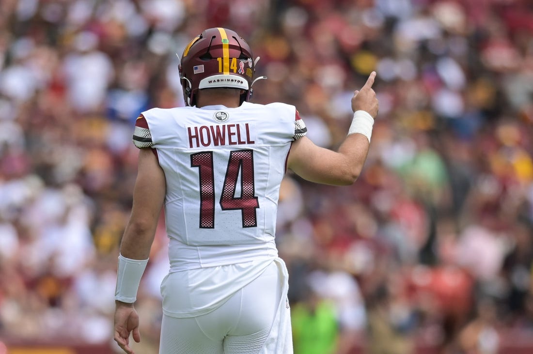 Sep 10, 2023; Landover, Maryland, USA; Washington Commanders quarterback Sam Howell (14) signals first down during the first quarter against the Arizona Cardinals  at FedExField. Mandatory Credit: Tommy Gilligan-USA TODAY Sports