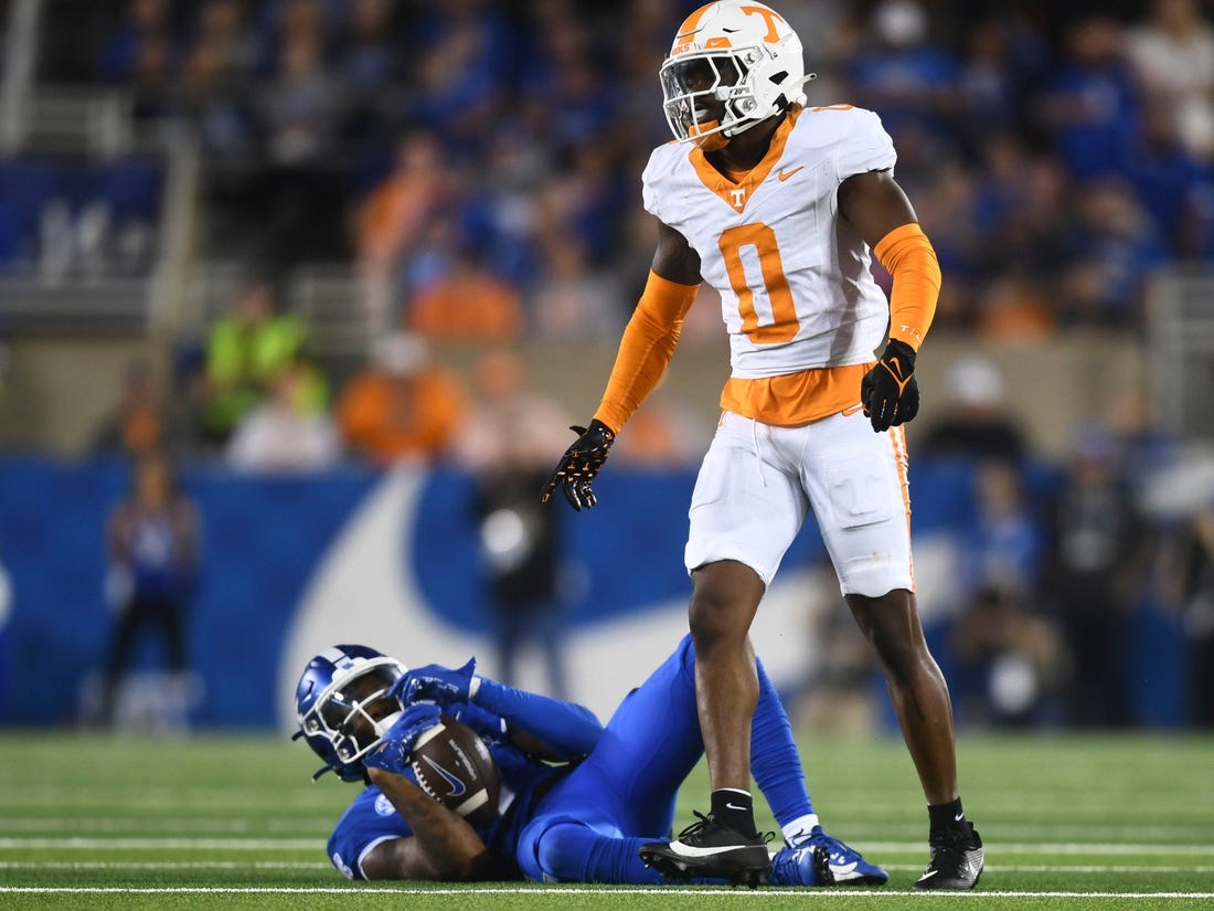 Kentucky wide receiver Barion Brown (7) after making a reception while covered by Tennessee defensive back Doneiko Slaughter (0) during an NCAA college football game on Saturday, October 28, 2023 in Lexington, KY.