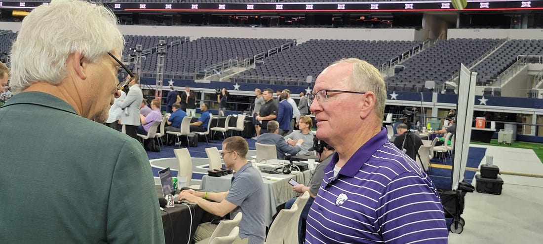 Kansas State athletics director Gene Taylor talks to a reporter Thursday during the second of Big 12 media days at AT&T Stadium in Arlington, Texas.