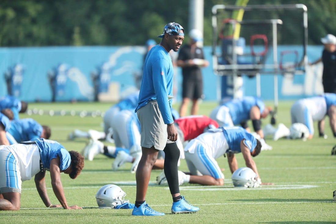 Lions quarterback Hendon Hooker watches players stretch during training camp on Thursday, Aug. 3, 2023, in Allen Park.