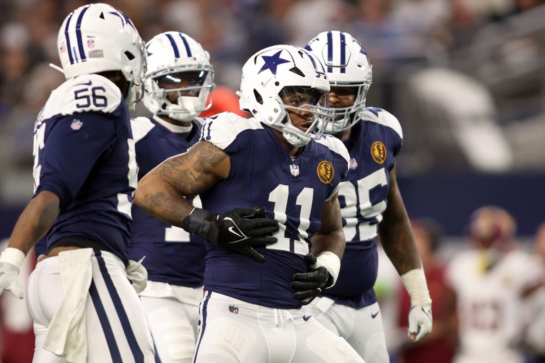 Dallas Cowboys linebacker Micah Parsons (11) celebrates a sack of Washington Commanders quarterback Sam Howell (not pictured) in the fourth quarter at AT&T Stadium. Mandatory Credit: Tim Heitman-USA TODAY Sports