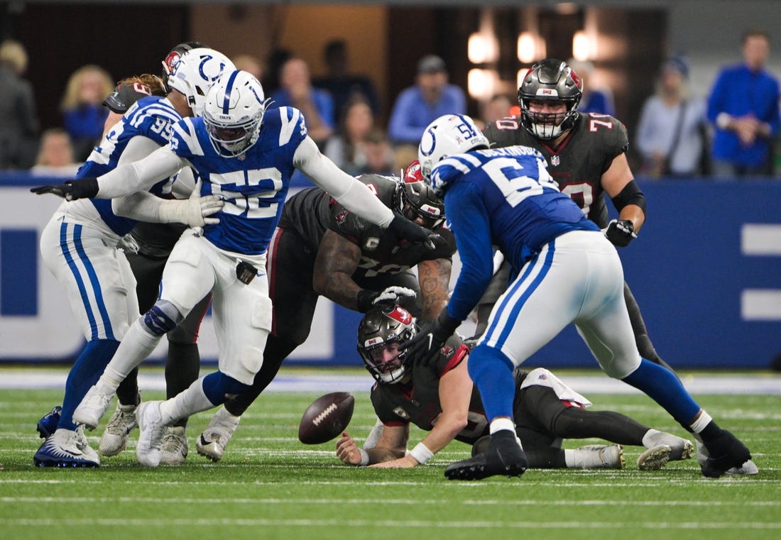 Nov 26, 2023; Indianapolis, Indiana, USA; Tampa Bay Buccaneers quarterback Baker Mayfield (6) is sacked and fumbles the ball toward the end of the second half against the Indianapolis Colts at Lucas Oil Stadium. Mandatory Credit: Marc Lebryk-USA TODAY Sports