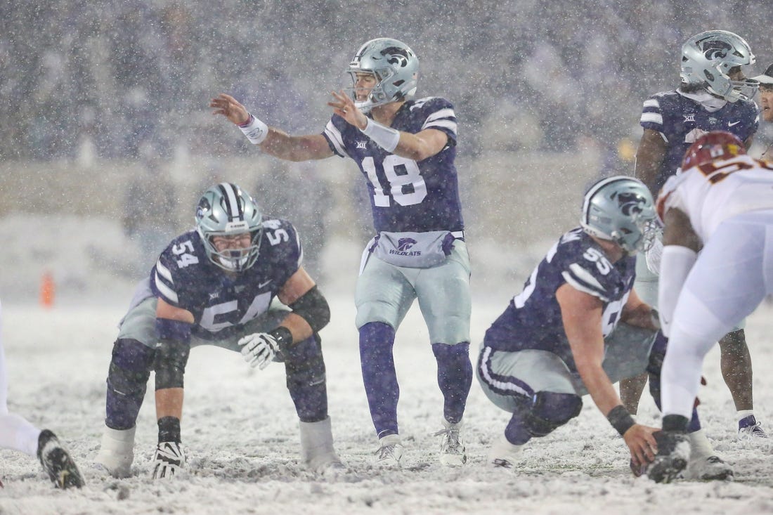 Nov 25, 2023; Manhattan, Kansas, USA; Kansas State Wildcats quarterback Will Howard (18) calls a play during the first quarter against the Iowa State Cyclones at Bill Snyder Family Football Stadium. Mandatory Credit: Scott Sewell-USA TODAY Sports