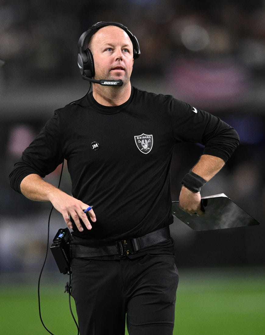 Jan 9, 2022; Paradise, Nevada, USA; Las Vegas Raiders assistant wide receivers coach Nick Holz looks on during the first half against the Los Angeles Chargers at Allegiant Stadium. Mandatory Credit: Orlando Ramirez-USA TODAY Sports