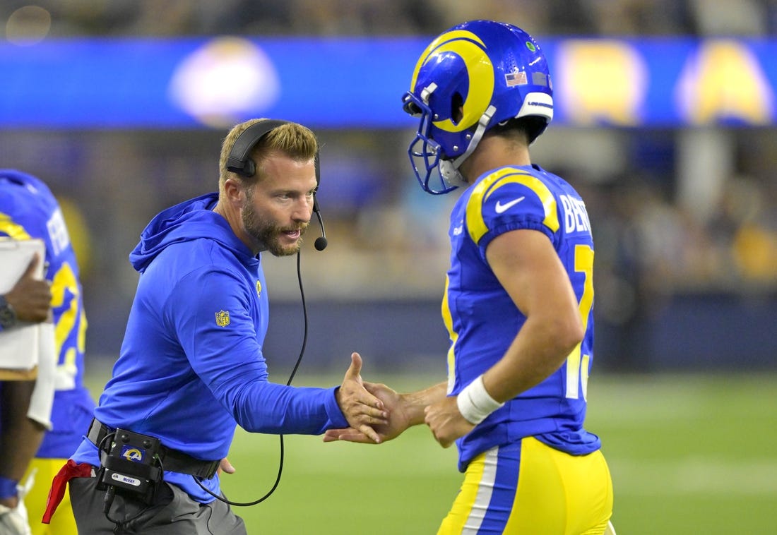 Aug 12, 2023; Inglewood, California, USA;   Los Angeles Rams coach Sean McVay congratulates quarterback Stetson Bennett (13) after a touchdown in the second half against the Los Angeles Chargers at SoFi Stadium. Mandatory Credit: Jayne Kamin-Oncea-USA TODAY Sports