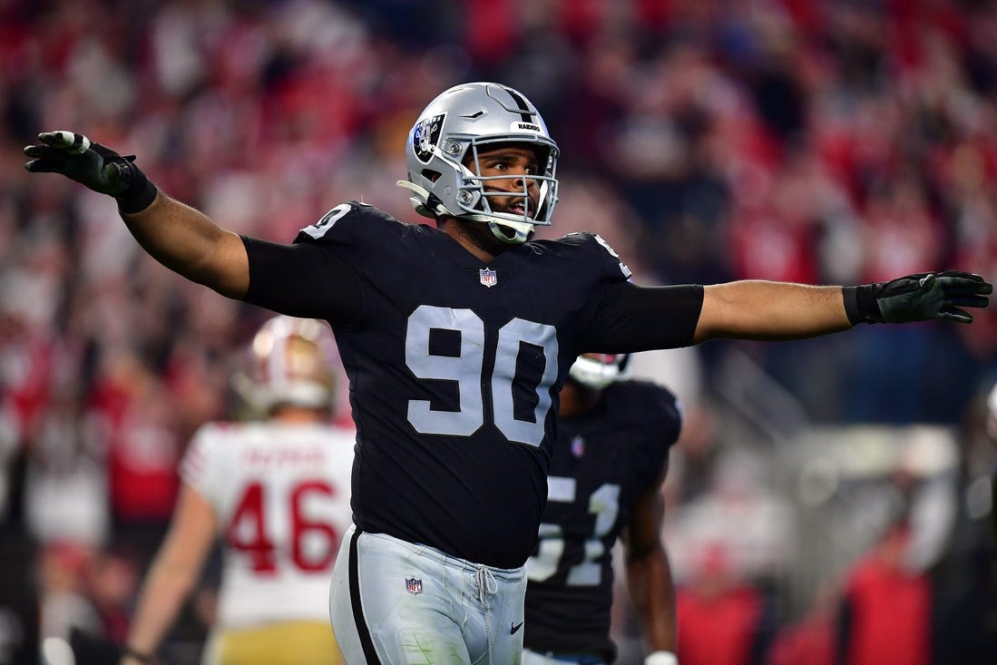 January 1, 2023; Paradise, Nevada, USA; Las Vegas Raiders defensive tackle Jerry Tillery (90) reacts after San Francisco 49ers place kicker Robbie Gould (9) misses a field goal during the second half at Allegiant Stadium. Mandatory Credit: Gary A. Vasquez-USA TODAY Sports