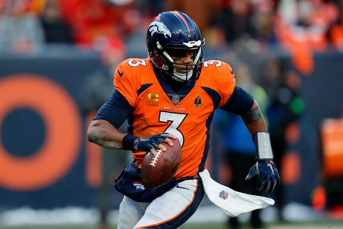 Oct 29, 2023; Denver, Colorado, USA; Denver Broncos quarterback Russell Wilson (3) scrambles in the fourth quarter against the Kansas City Chiefs at Empower Field at Mile High. Mandatory Credit: Isaiah J. Downing-USA TODAY Sports