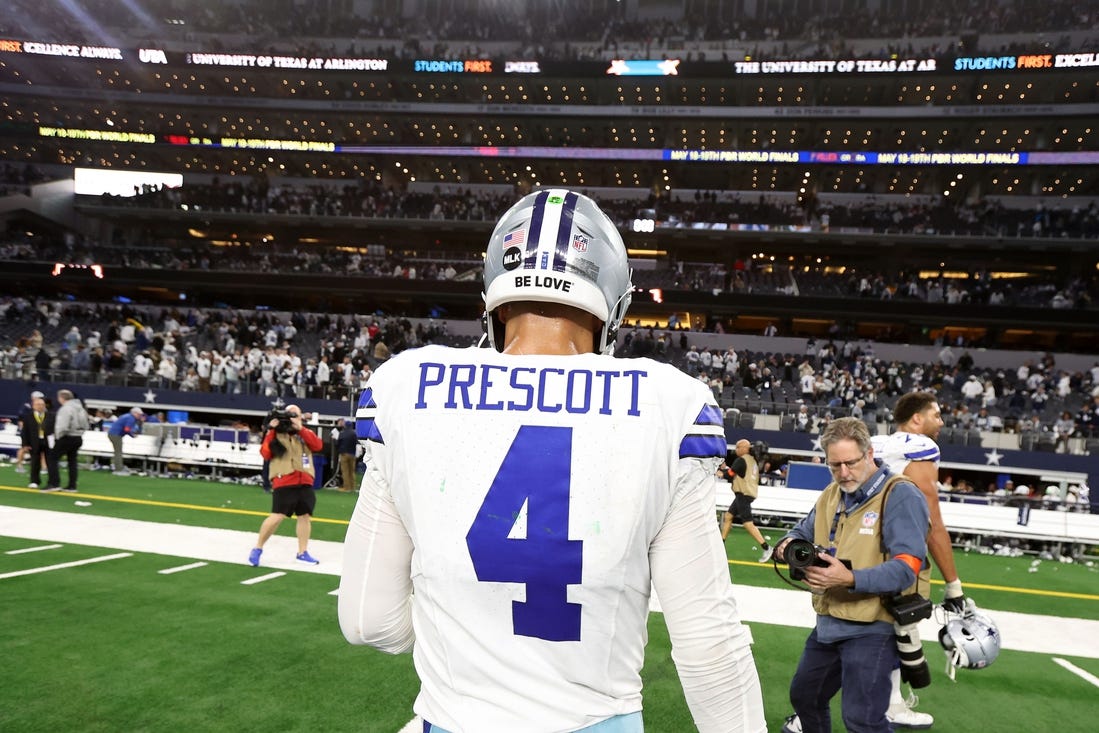 Jan 14, 2024; Arlington, Texas, USA; Dallas Cowboys quarterback Dak Prescott (4) walks off the field after losing in the 2024 NFC wild card game against the Green Bay Packers at AT&T Stadium. Mandatory Credit: Tim Heitman-USA TODAY Sports