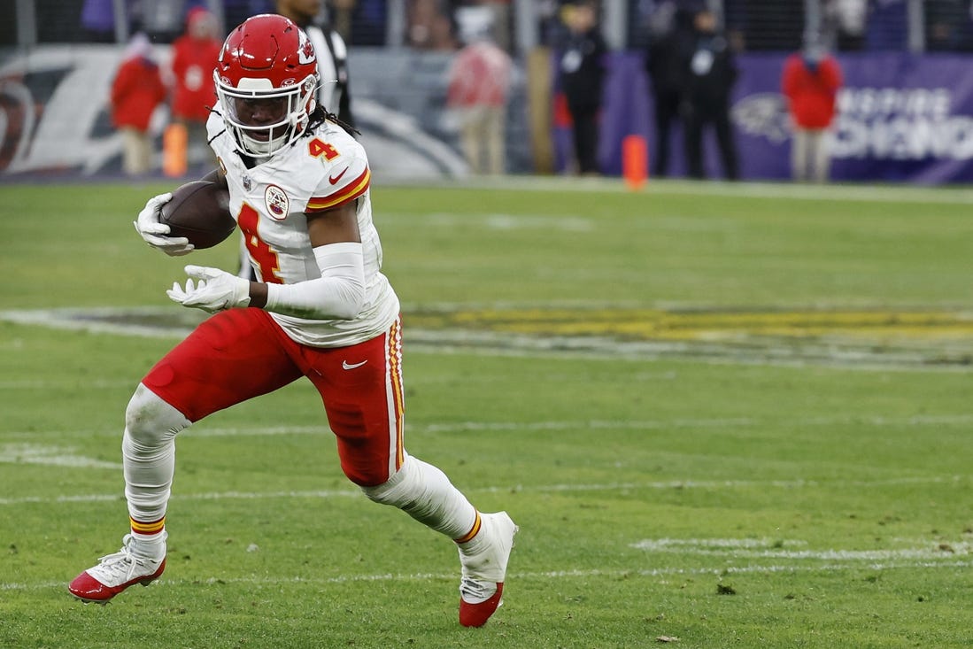 Jan 28, 2024; Baltimore, Maryland, USA; Kansas City Chiefs wide receiver Rashee Rice (4) carries the ball against the Baltimore Ravens in the AFC Championship football game at M&T Bank Stadium. Mandatory Credit: Geoff Burke-USA TODAY Sports